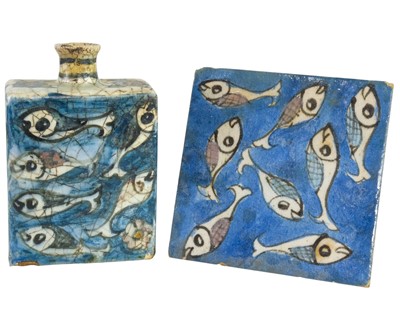 Lot 363 - A Persian pottery tile.