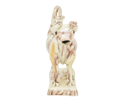 Lot 629 - A creamware Whieldon type cow creamer and cover.