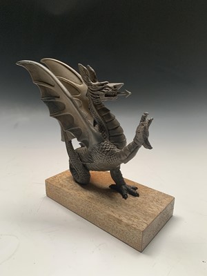 Lot 204 - A Peter Hicks bronzed sculpture of a dragon,...