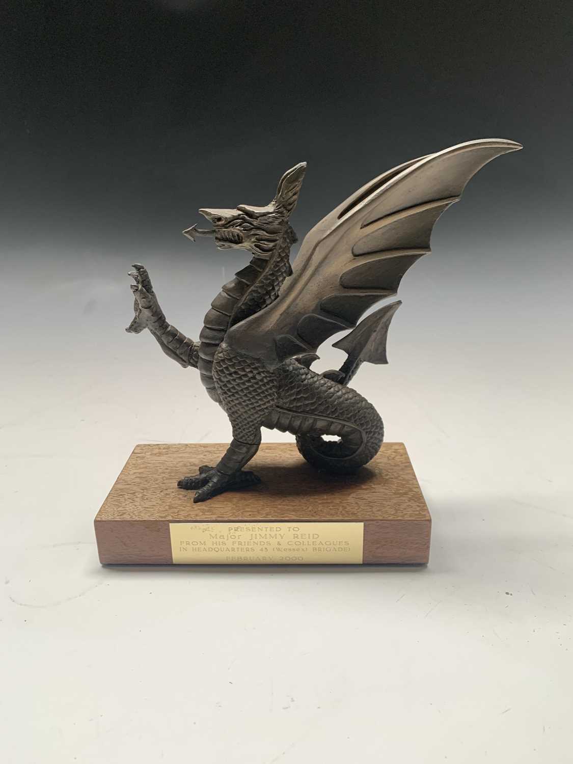 Lot 204 - A Peter Hicks bronzed sculpture of a dragon,...