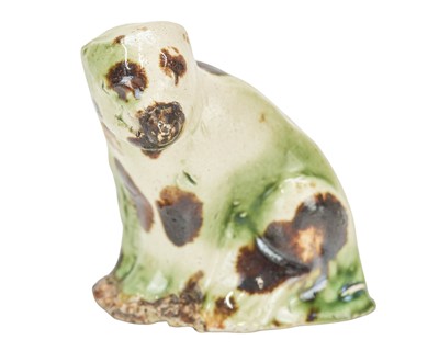 Lot 598 - A Wheildon type pottery figure of an animal.