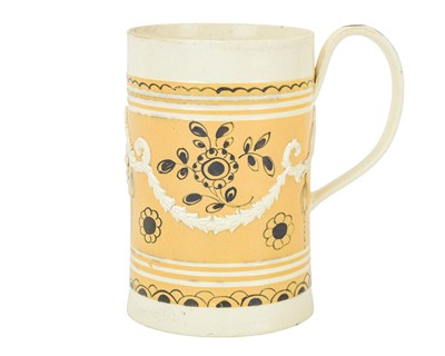 Lot 622 - A Staffordshire creamware mug.