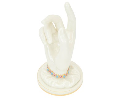 Lot 564 - A Royal Worcester model of Mrs Hadley's hand ring holder