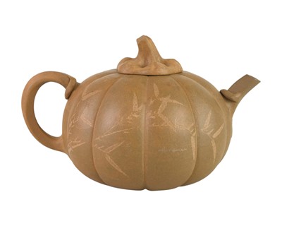 Lot 305 - A Chinese Yixing pumpkin teapot and cover.