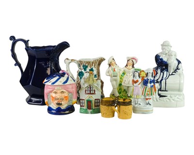 Lot 618 - A Victorian Staffordshire pottery jug.