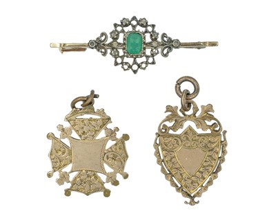 Lot 477 - Two gilt armorial crest watch fobs and a gilt-metal bar brooch.