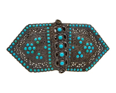 Lot 352 - A silver and turquoise set buckle.