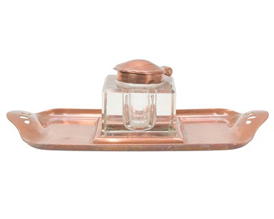 Lot 222 - An Art Nouveau copper inkstand.