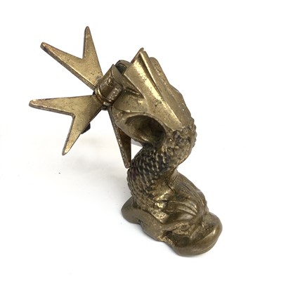 Lot 185 - A brass door knocker modelled as a dolphin...