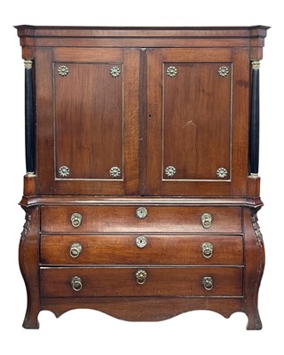Lot 836 - A Dutch oak cabinet on bombe chest.