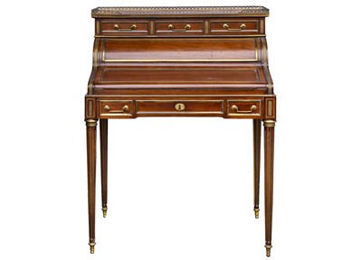 Lot 831 - A Louis XVI style mahogany and brass inlaid bureau de dame.