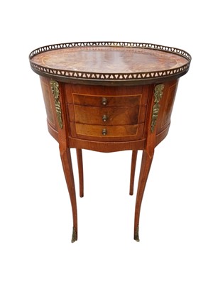 Lot 846 - A French Louis XVI style kingwood oval bedside chest.