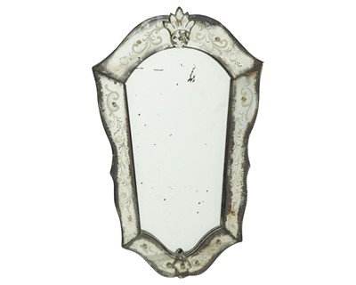 Lot 758 - A Venetian cartouche shape wall mirror.