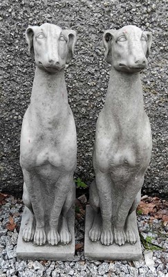 Lot 441 - A pair of cast concrete sculptures of seated whippets.
