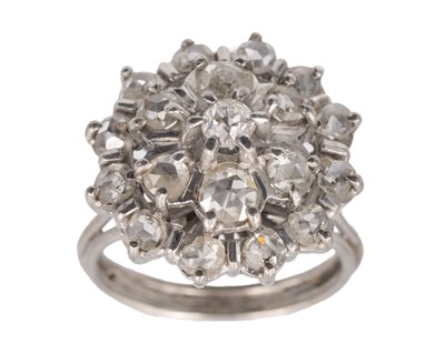 Lot 202 - An 18k white gold old mine-cut and rose-cut diamond set cluster ring.