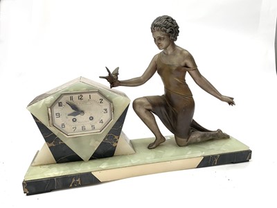 Lot 265 - A French Art Deco marble clock, of angular...