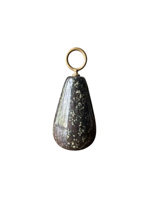 Lot 108 - A Cornish dark grey and red veined serpentine door stopper with brass loop handle.