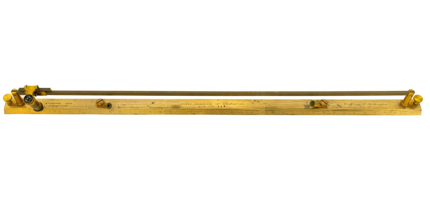 Lot 47 - A W & T Avery lacquered brass standard yard comparator.