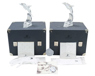 Lot 546 - Two boxed Swarovski crystal Maxi Dolphins.