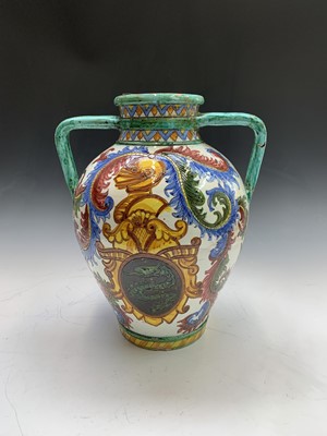 Lot 803 - An Italian majolica twin handled painted vase....