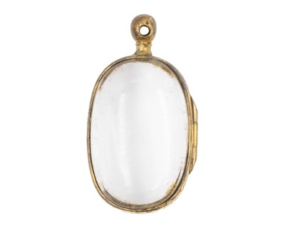 Lot 406 - A Victorian 'pool of light' rock crystal pendant.