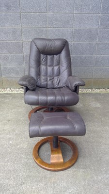 Lot 13 - A Stressless Style Reclining Chair and Footstool.