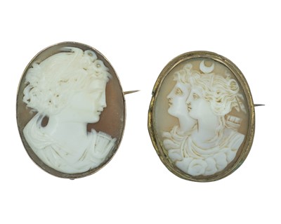 Lot 416 - Two shell cameo brooches.