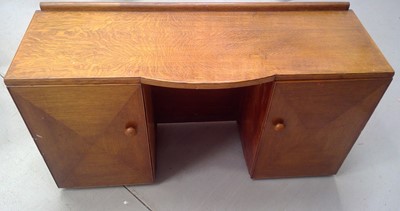 Lot 26 - A Mid-century Nero Oak Writing Desk. 76cm tall,...