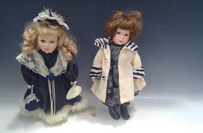 Lot 76 - Two Ceramic Head Dolls. The Dolls are 43cm tall.