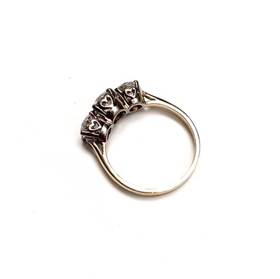 Lot 2342 - A good three stone diamond ring totaling...