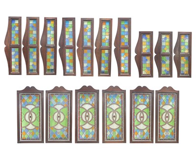 Lot 206 - A group of six stained glass panels and ten similar room divider top mounts.