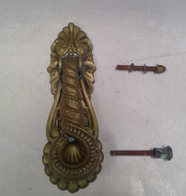 Lot 28 - A Heavy Brass Door Knocker. The piece is 21cm...