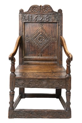 Lot 685 - A 17th century oak wainscot armchair.