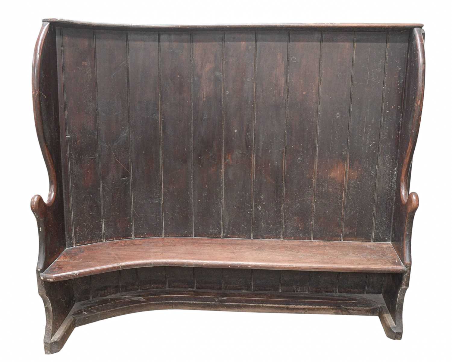 Lot 681 - A George III stained pine settle.