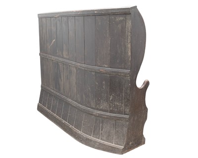 Lot 681 - A George III stained pine settle.