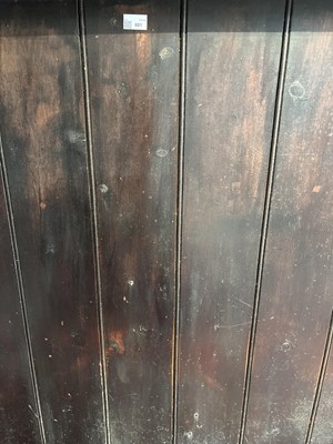 Lot 681 - A George III stained pine settle.