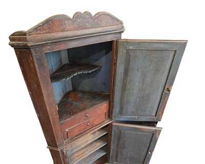 Lot 738 - A 19th century painted pine floor standing corner cupboard.