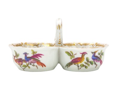 Lot 583 - A Meissen porcelain double salt with loop handle.