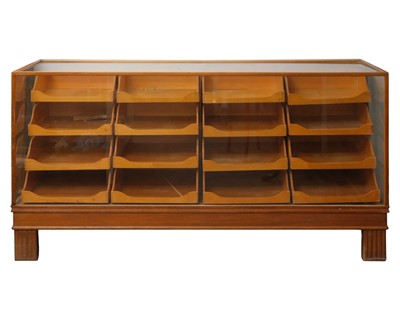Lot 842 - An early 20th century shop/ haberdashery display counter.