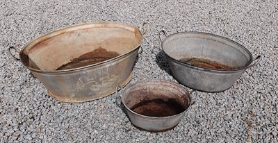 Lot 423 - Three galvanised tin baths.