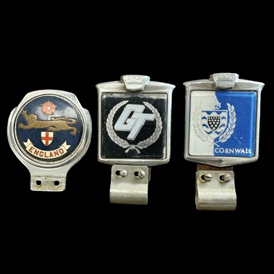 Lot 67 - Three vintage car badges.
