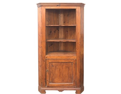 Lot 686 - A standing pine corner cupboard.