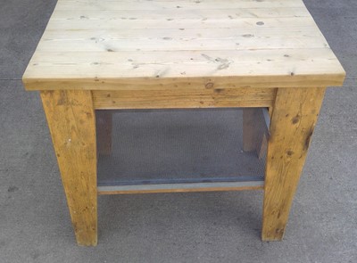 Lot 2 - A Heavy Wood and Metal Butcher's Block. The...