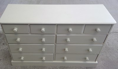 Lot 8 - A Large Painted Pine Chest of Drawers. The...