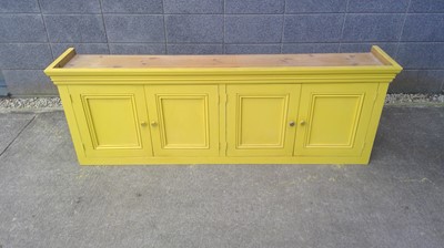 Lot 7 - A Painted Pine Cupboard. 183cm wide, 64cm tall...