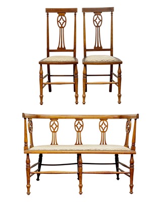 Lot 815 - An Edwardian walnut and inlaid three piece salon suite.