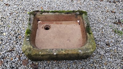 Lot 182 - A stone sink. Height 16cm, width 68cm, depth...
