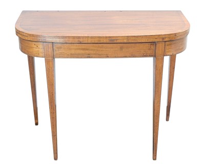 Lot 889 - A George III mahogany and crossbanded fold top card table.