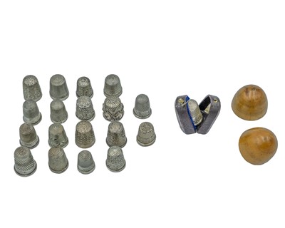 Lot 181 - A selection of seventeen silver thimbles.
