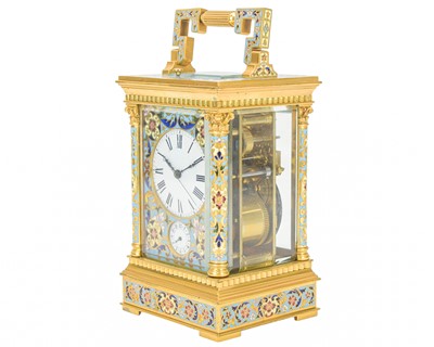 Lot 770 - A French champleve enamel grande sonnerie repeating carriage alarm clock.